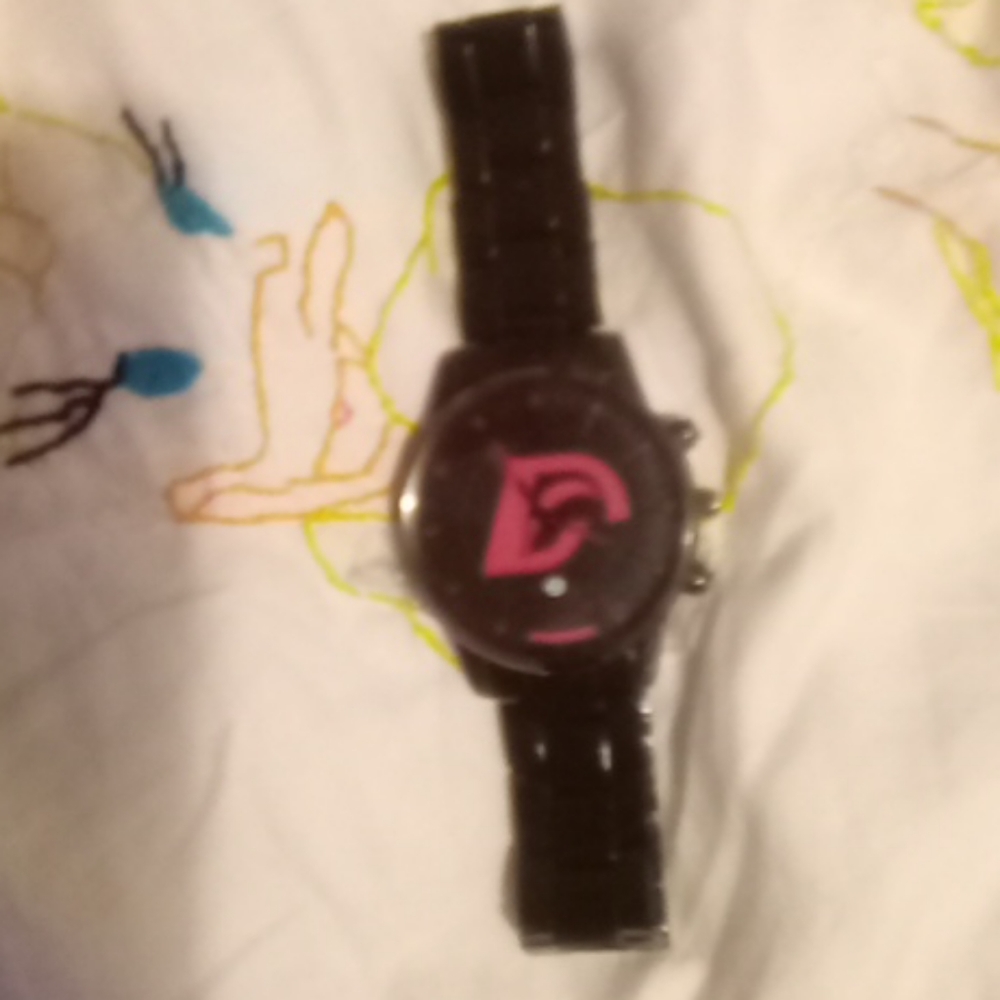 Dijaines wrist watch with stainless steel band.
